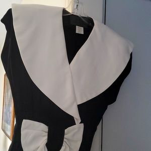 Black dress with white collar and bow